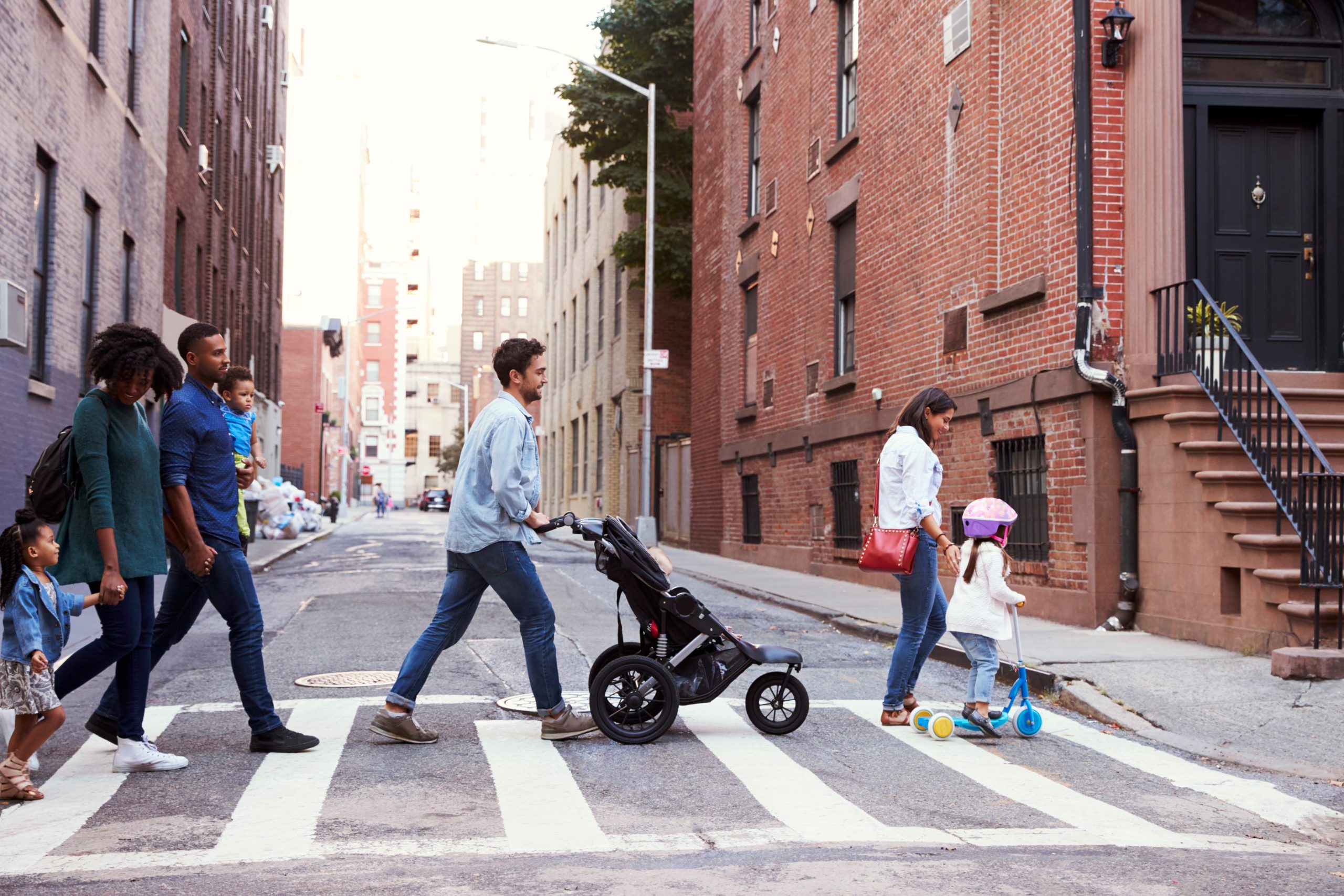 families in a crosswalk
